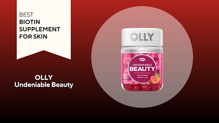 An image of a bottle of OLLY Undeniable Beauty gummies against a red background.